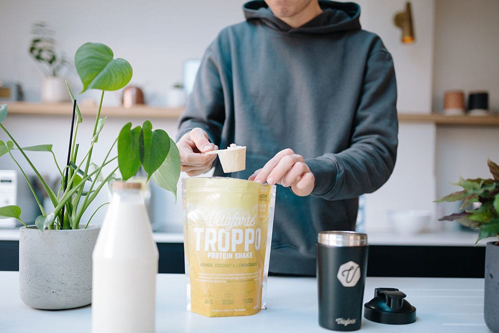 Man making a Troppo protein shake