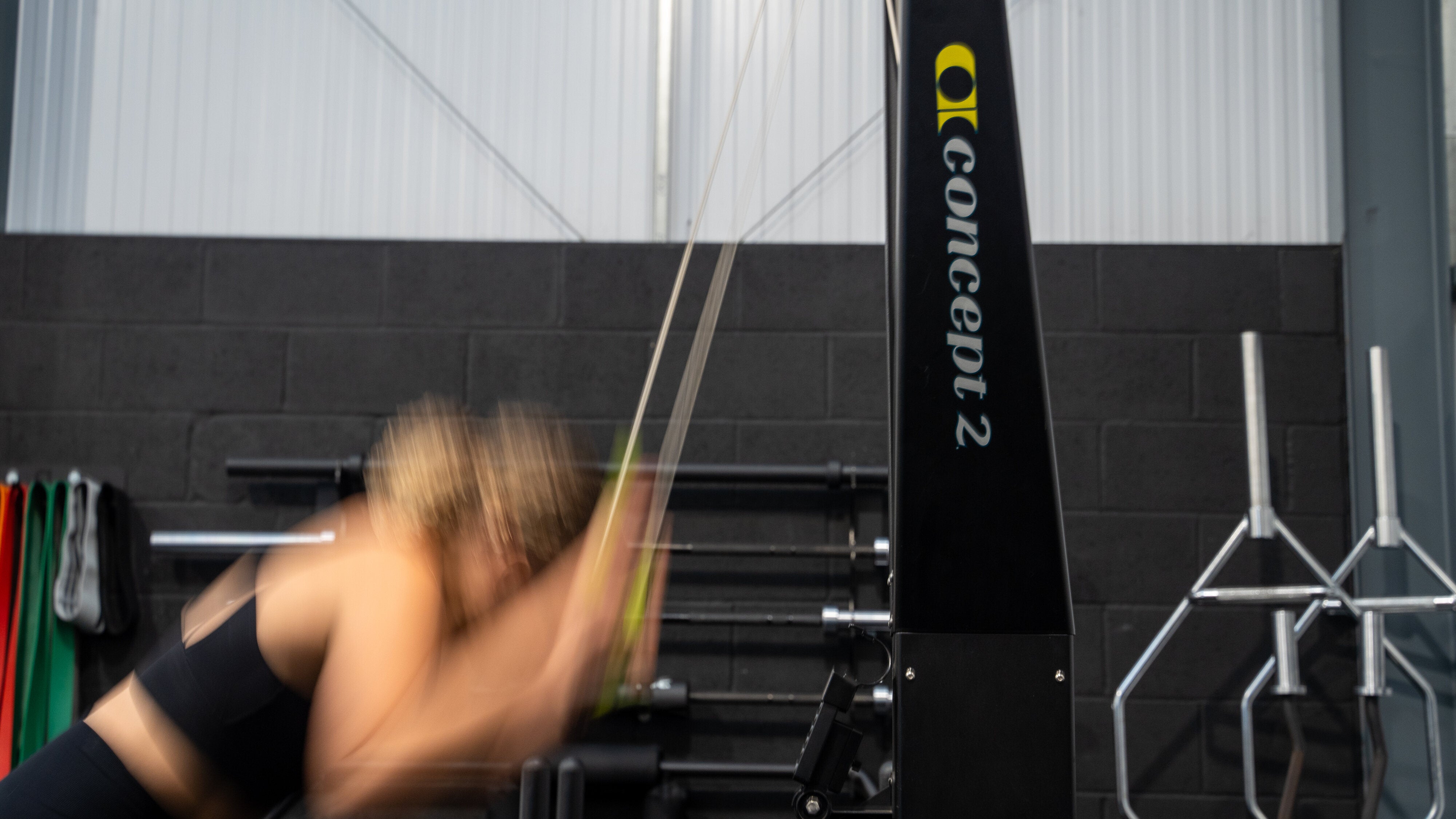 A woman training for Hyrox in the gym