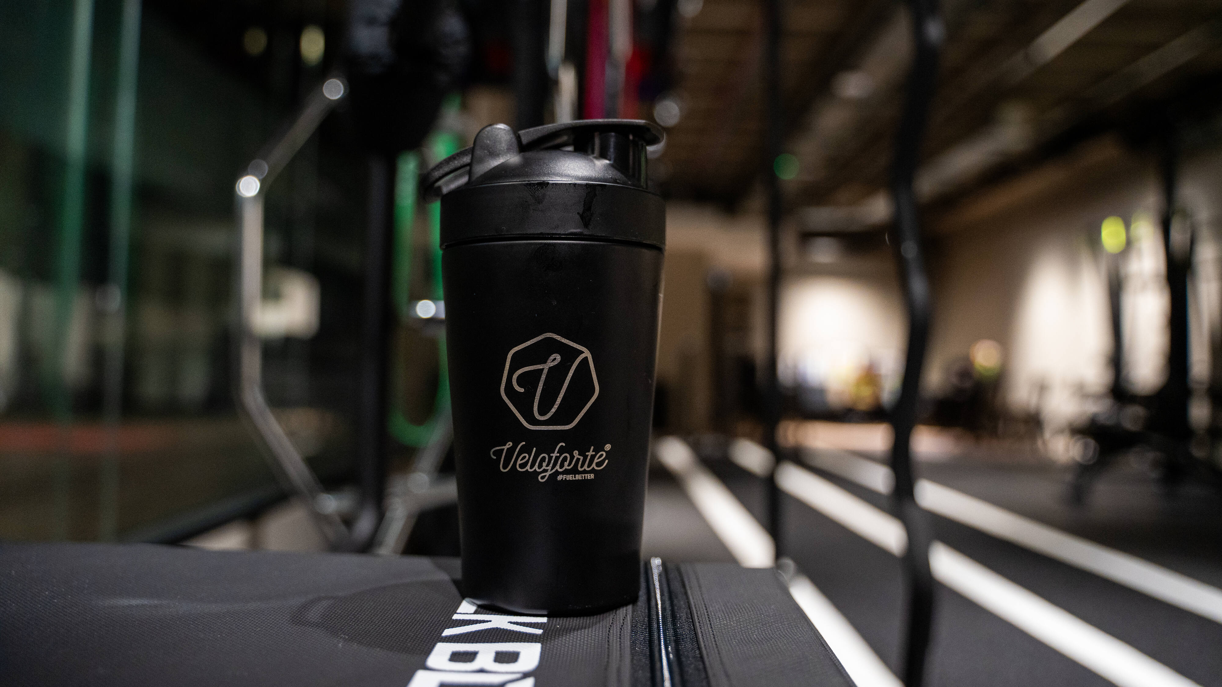 An image of Veloforte's protein shaker in a gym