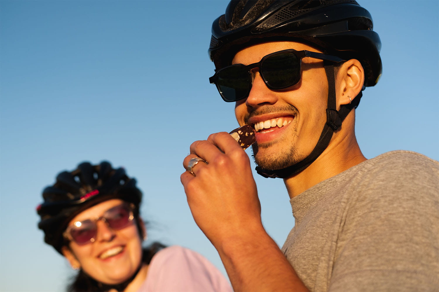 Man eating high energy snack for cycling