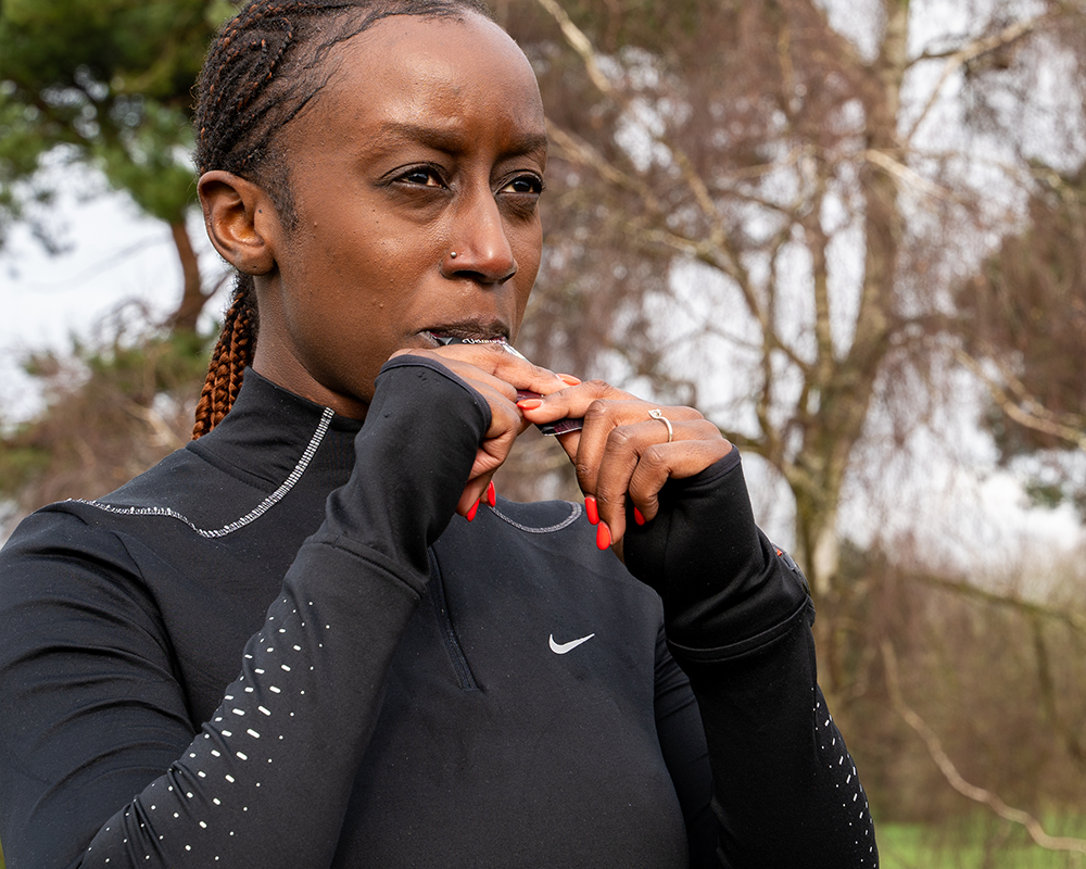 runner eating energy gel