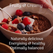  bowl of cocoa overnight oats with berries and nuts, labeled 'Fruity & Creamy' on a dark background
