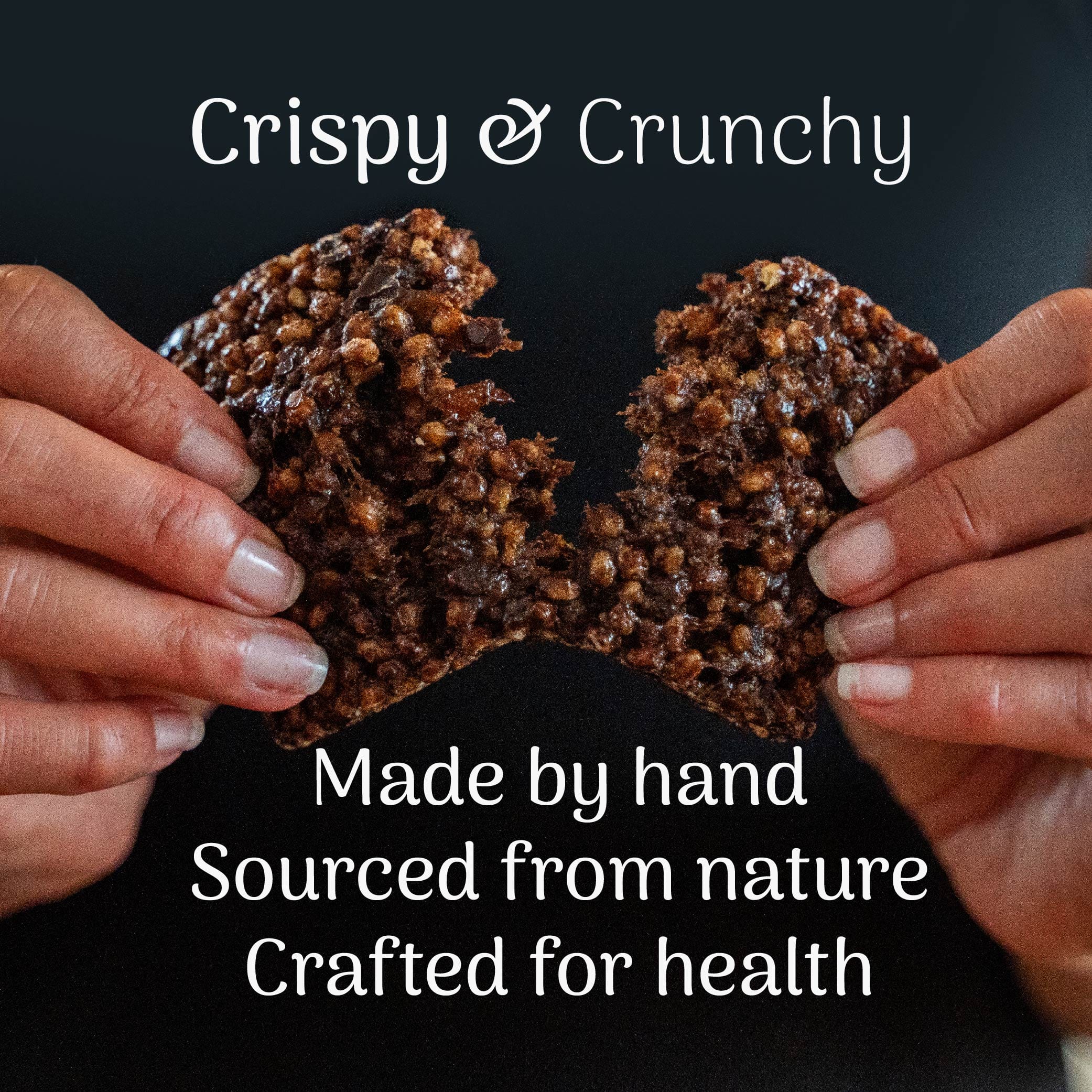 Hands holding a crispy and crunchy Cocoa & Ginger Protein Bar with text about its origin and health benefits on a dark background