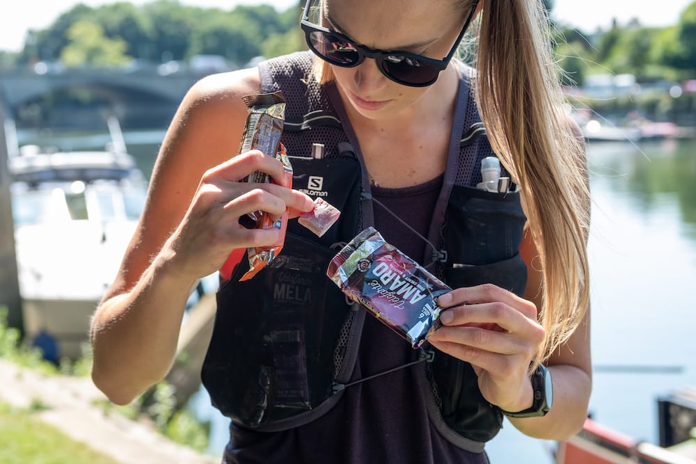 Young woman on a run using Veloforte Amaro Energy Chews