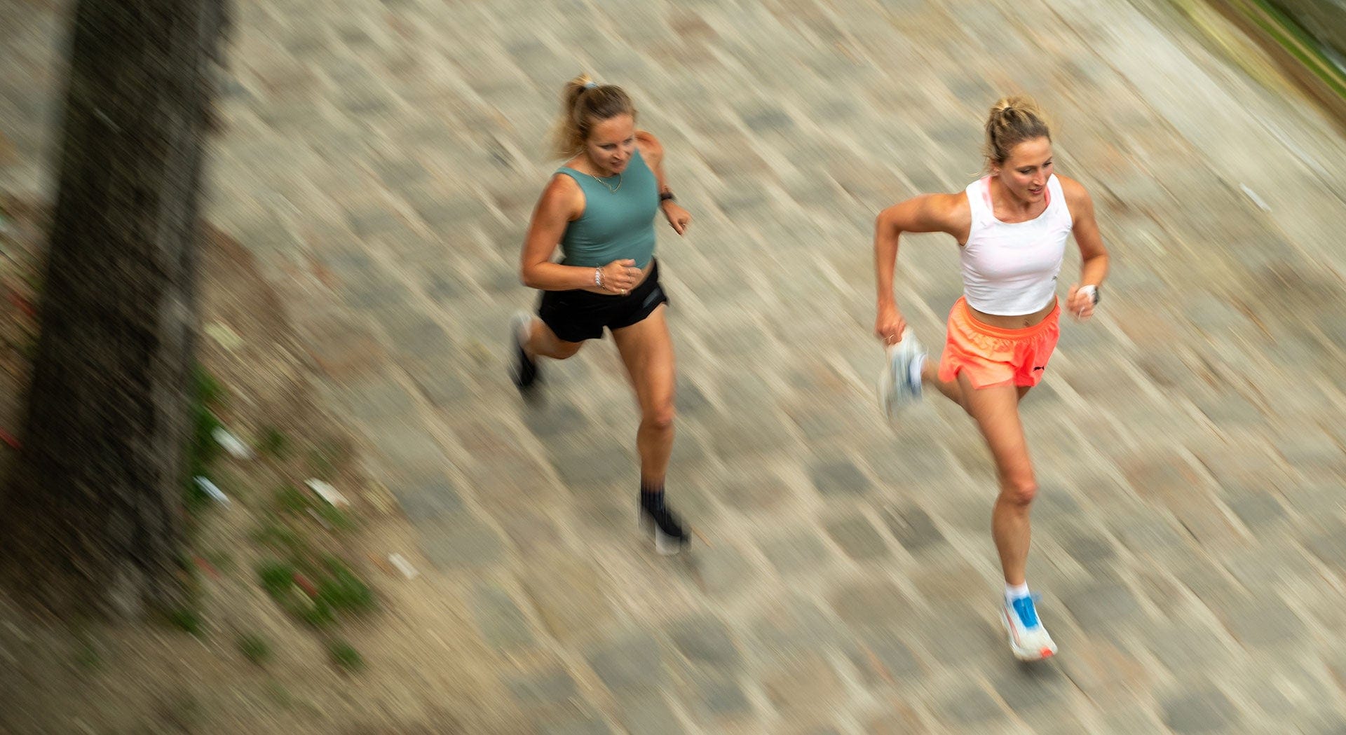 two women running
