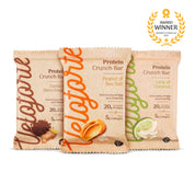 Three Veloforte protein crunch bar packages with different flavours on a white background, featuring an award badge.