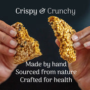 Two hands holding crispy and crunchy snacks with text about their origin and health benefits on a dark background.