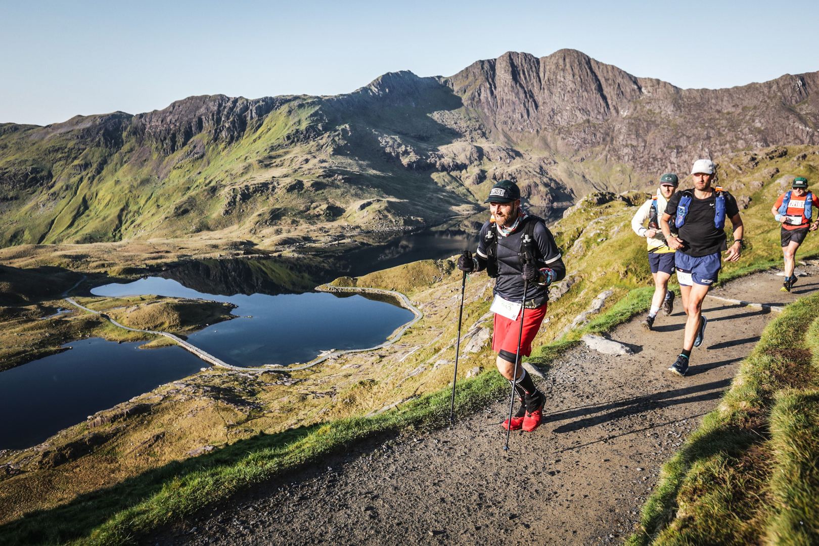 Men completing the UTS 100km race in Snowdon