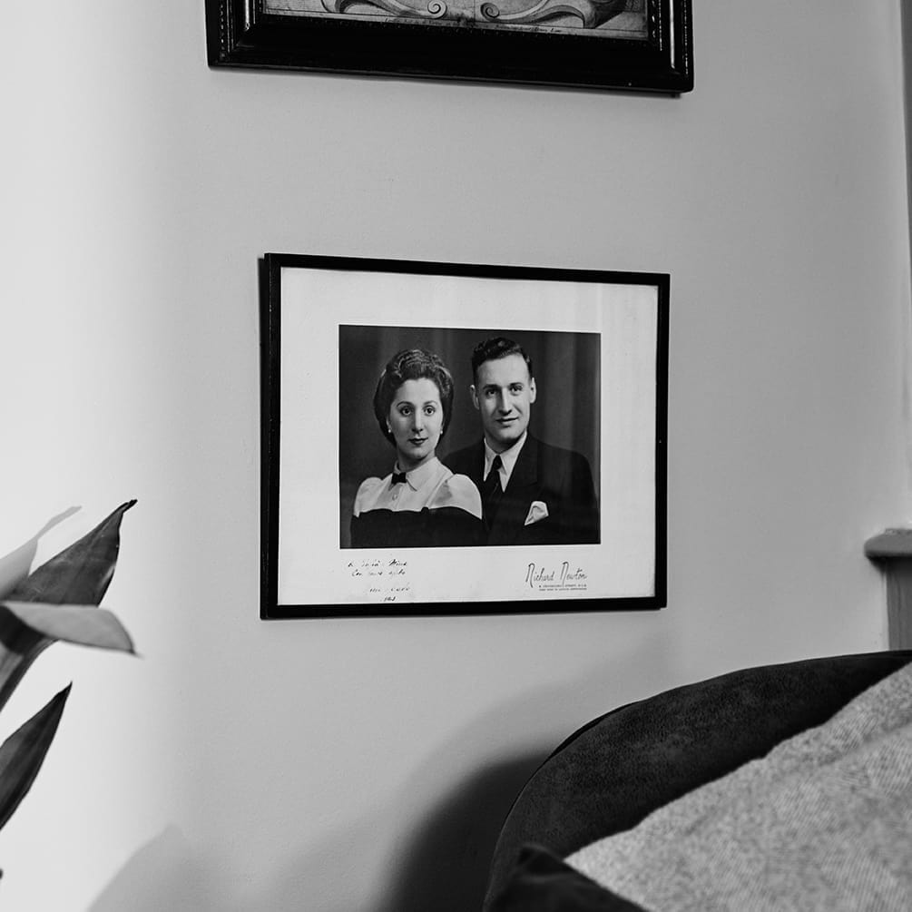 Framed black and white picture of the Giusti family